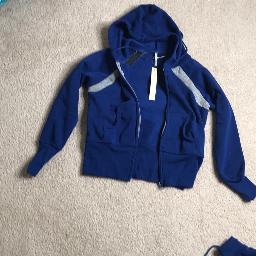 Black and grey Love nation jacket (brand new)